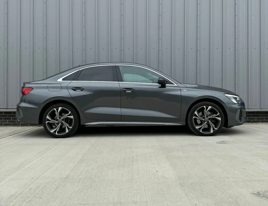 Dark grey mercedes with ppf installed and alloy wheels.